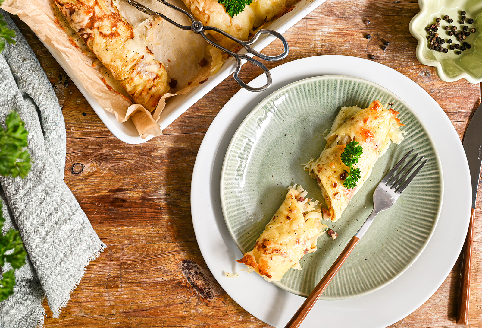 Deftige Krautpalatschinken mit Käse überbacken